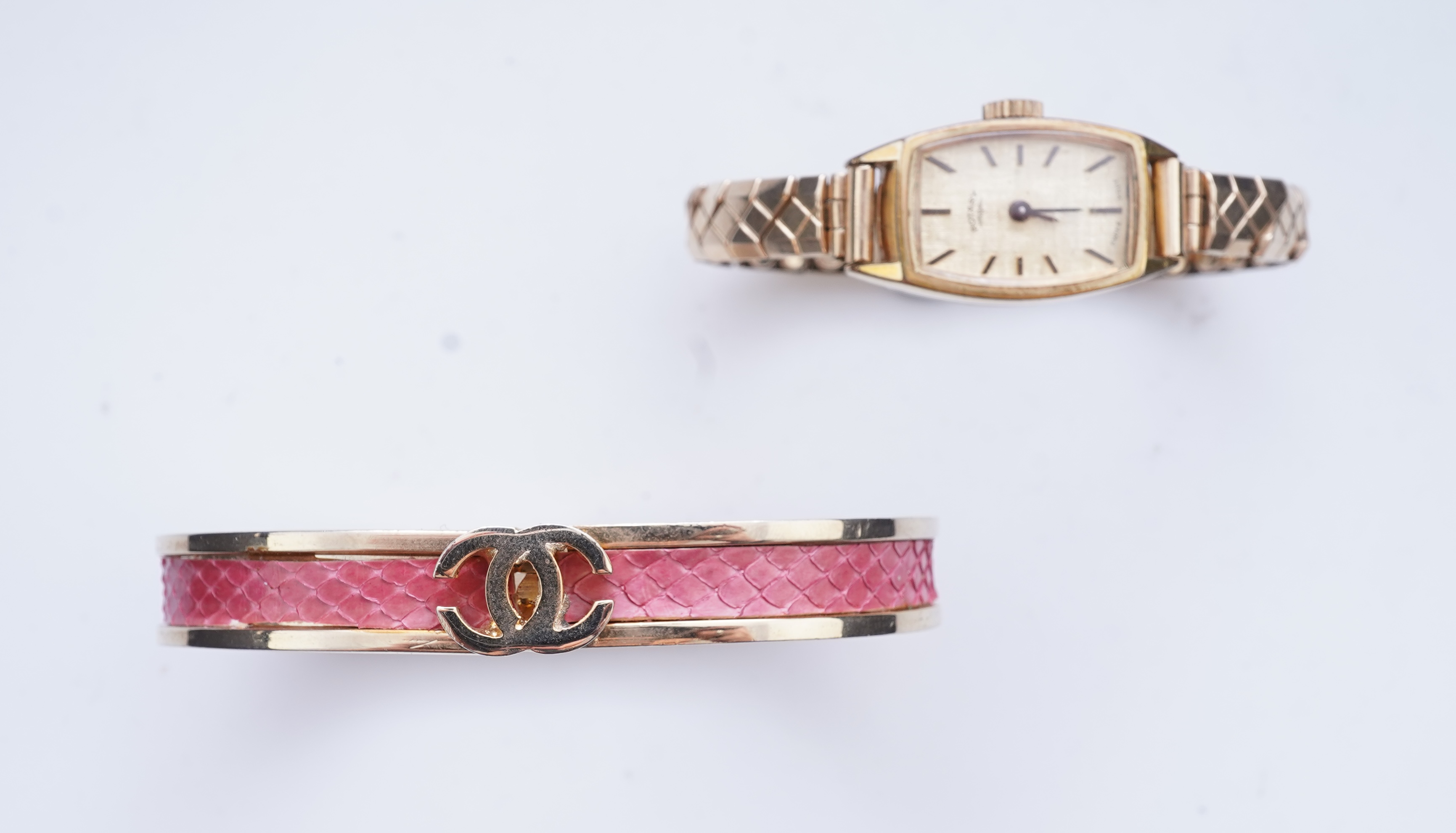 XX REMOVE ROLEX XX, A collection of watches and a bangle, comprising: two Seiko quartz watches; a manual winding watch by Larex; a quartz watch by Eterna; a quartz watch by Rotary; and a quartz watch by Pulsar; together